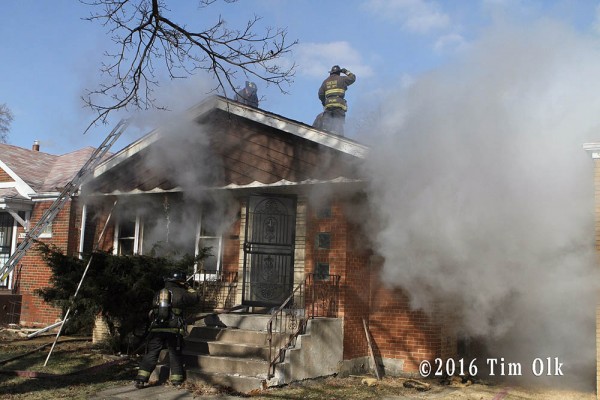 Chicago firefighters battle house fire