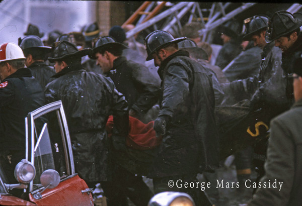 historic Chicago fire scene photo as firemen recovery a fallen firemen