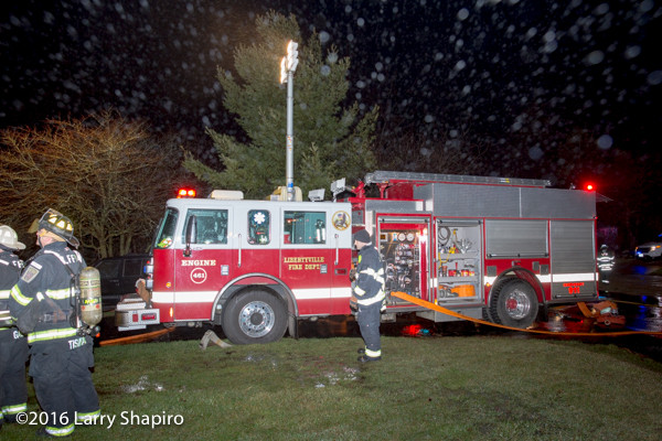 Pierce fire engine with ail-burt light tower at fire scene