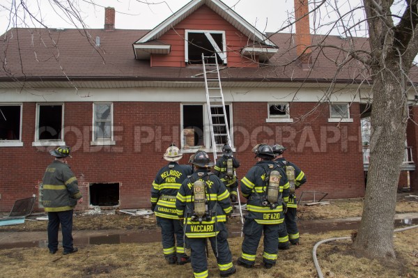 firefighters outside of house fire