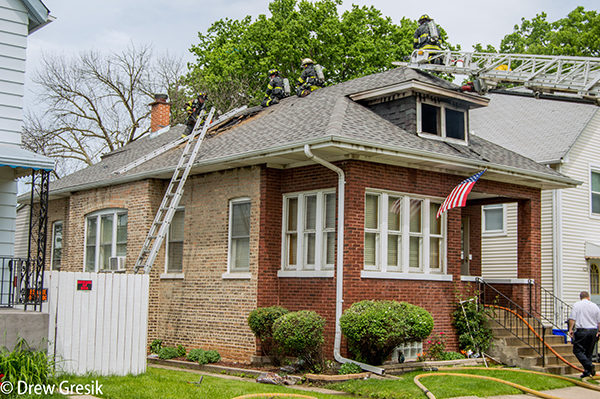 ladders to roof of house fire