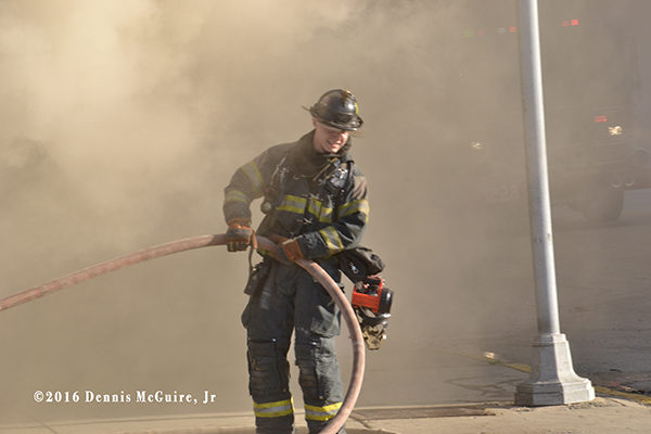 firefighter surrounded by smoke
