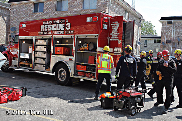 fire department technical rescue crews at a building collapse