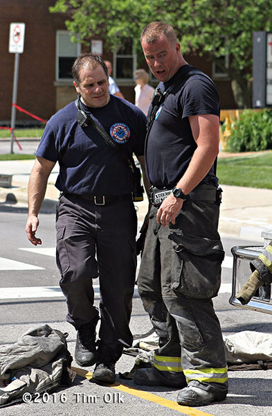 firefighters work on a hot day