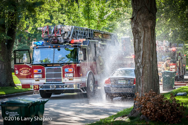 water shoots from bad valve on fire truck