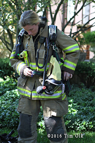 female firefighter in PPE