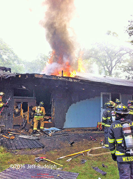 firefighters battle house fire