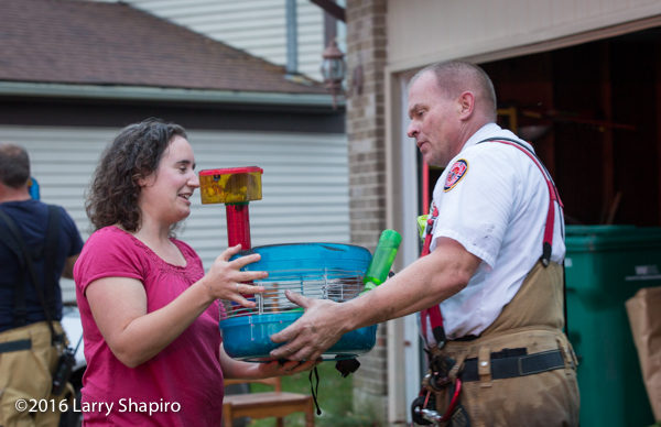 firefighter gives pets to fire victim