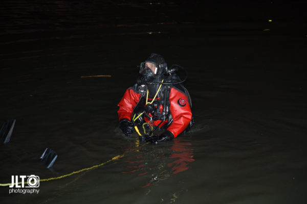 fire department diver at night