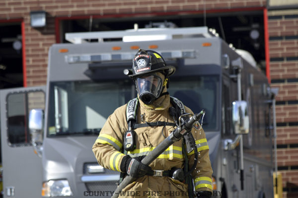 firefighter with hose
