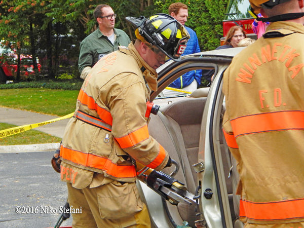 firefighters demonstrate a vehicle extrication