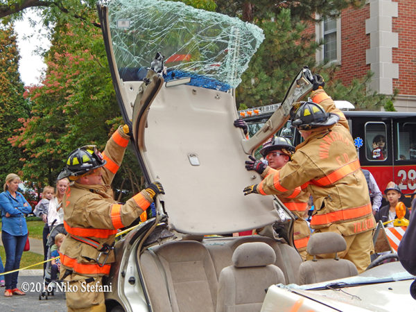 firefighters demonstrate a vehicle extrication