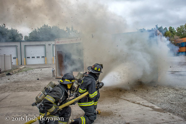 firefighters demonstrate firefighting