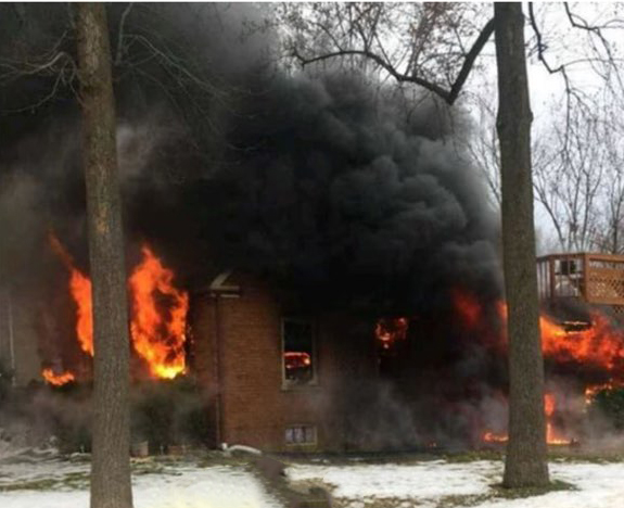 house fully engulfed in fire