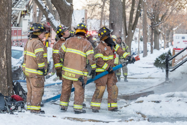firefighters working in frigid temperatures