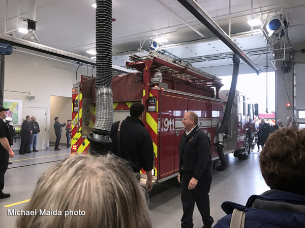 fire engine being pushed into new fire station