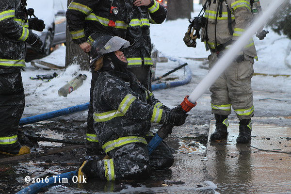 Firefighter encrusted in ice at fire scene
