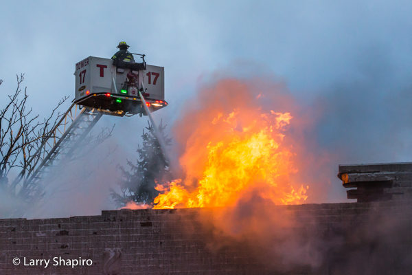 Pierce tower ladder working with huge flames