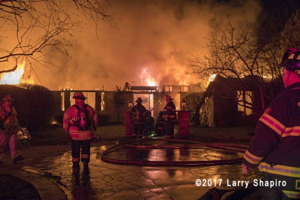 firefighters battle fire that destroys a huge mansion
