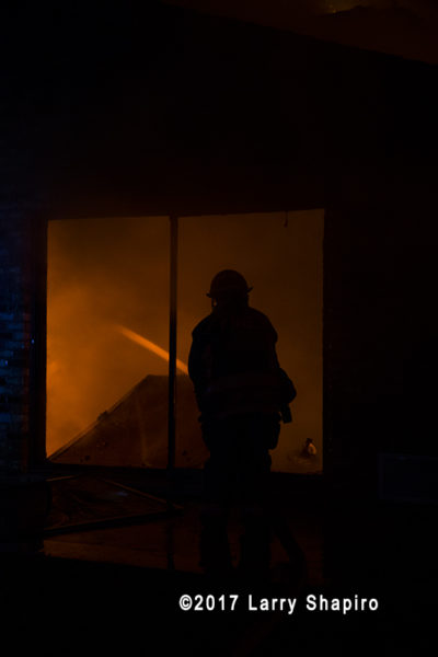 firefighter silhouette with fire