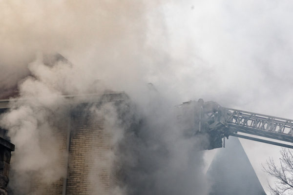 firefighters engulfed in smoke