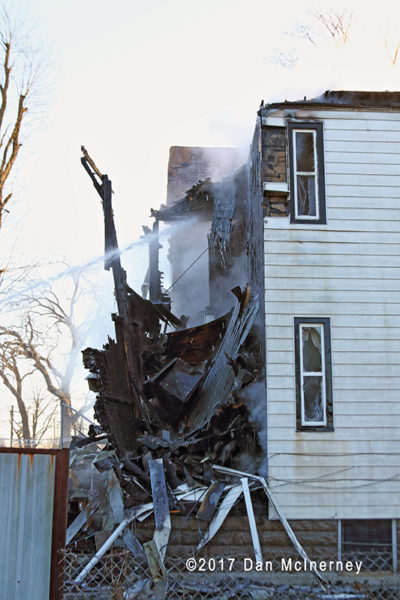 aftermath of house fire with collapse