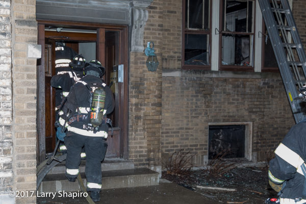 Firefighters enter apartment building after fire