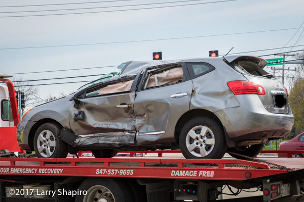 Nissan SUV after t-bone crash and rollover