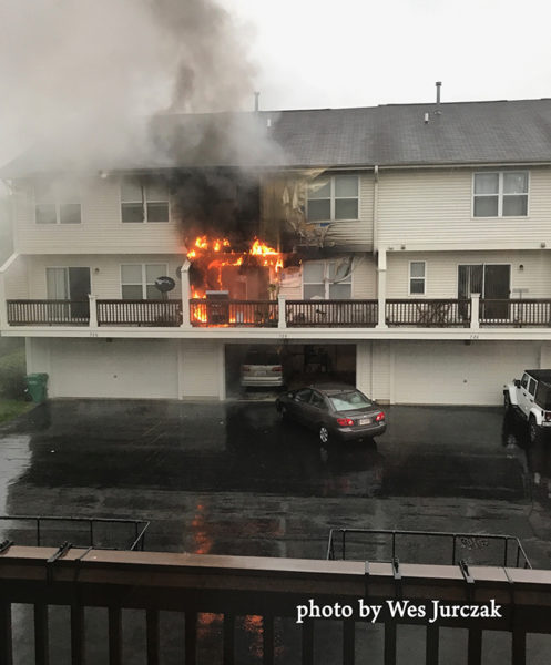apartment deck engulfed in flames