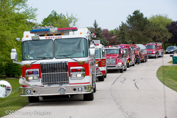 fire trucks staged in a line