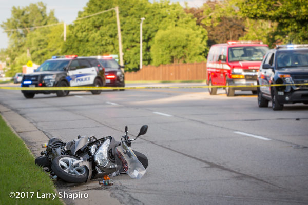 motorcycle in roadway after crash