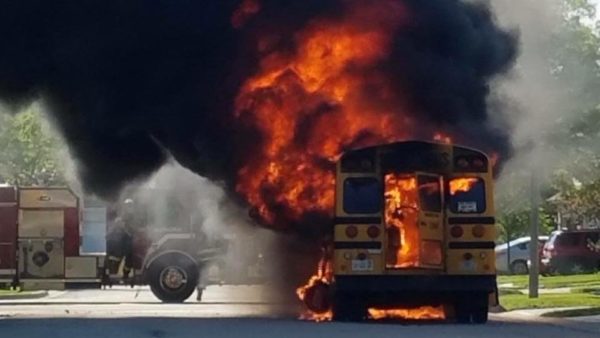 school bus engulfed in fire