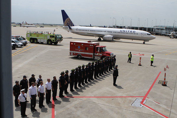 firefighters honor fallen brother arriving by plane