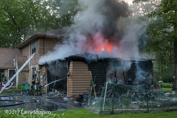 fire through roof of an attached garage
