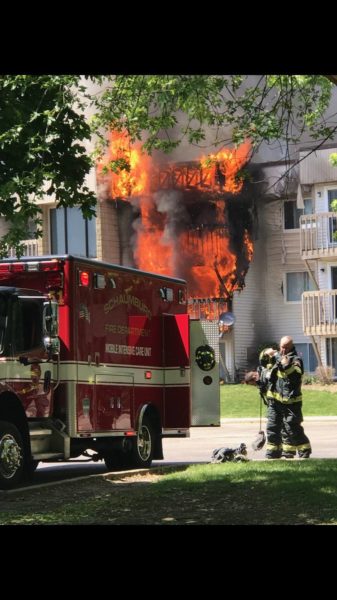 flames burn through apartments