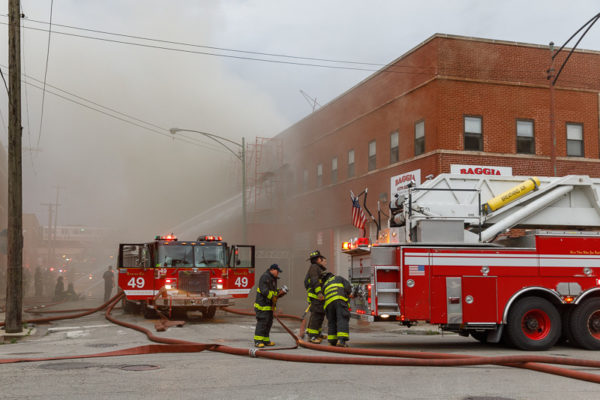 Chicago Firefighters and fire trucks at fire sene
