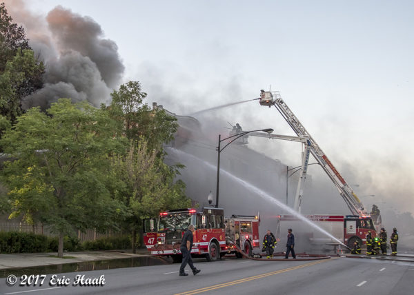 Chicago fire trucks at a 2-11 alarm fire