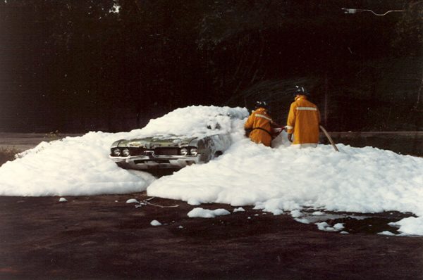 vintage photo of firefighters training with high expansion foam