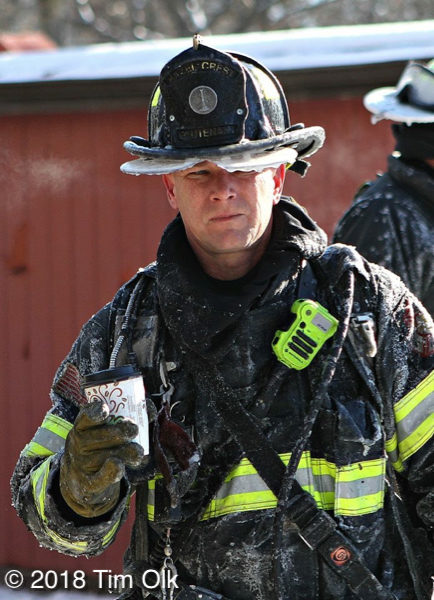 firefighter covered with ice