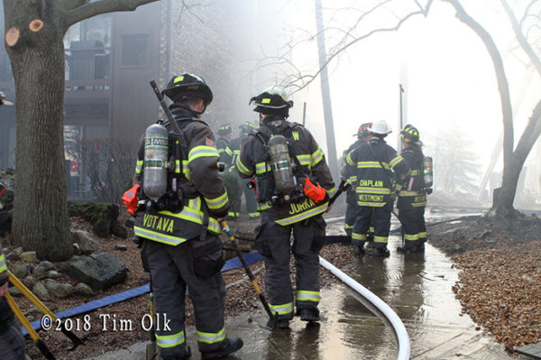 firefighters at fire scene