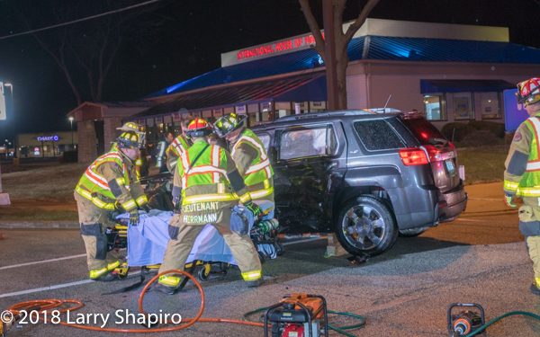 Firefighter/paramedics remove victim after car crash
