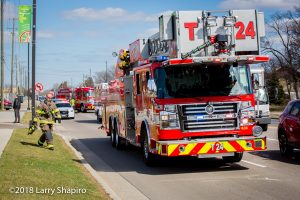 Rosenbauer America Commander fire trucks on scene