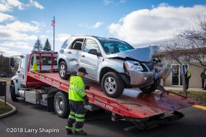 Gene's Towing with damaged Chevy Equinox