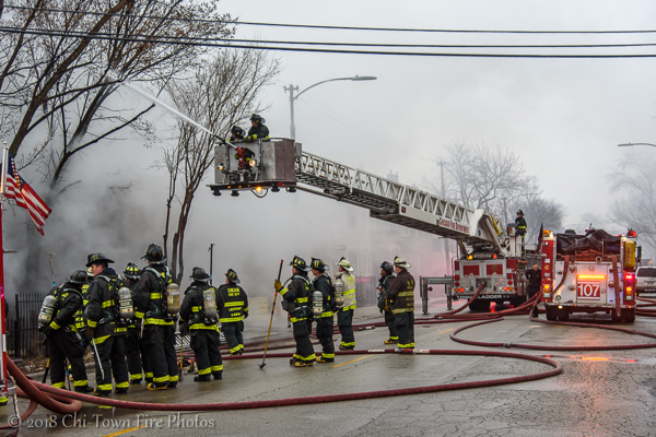 Chicago Firefighters and fire trucks at work