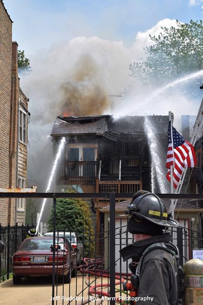 Firefighters battle fire on rear porches in Chicago