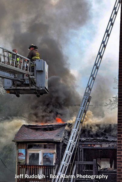 Firefighters battle fire on rear porches in Chicago