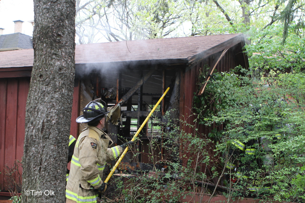 Firefighters fight garage fire