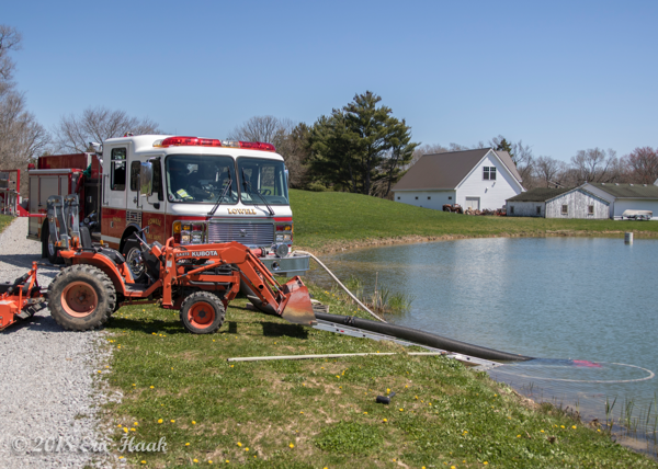 Lowell FD engine drafting from a pond