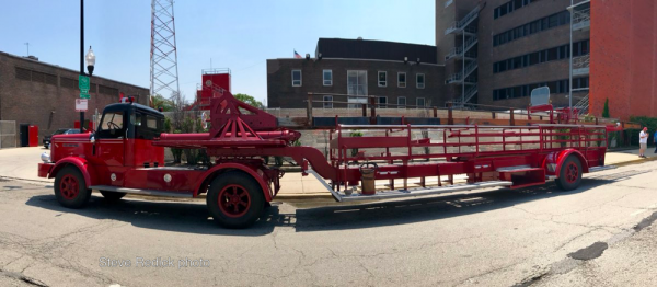 antique Chicago FWD tractor-drawn aerial ladder truck