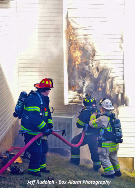 Firefighters fight house fire